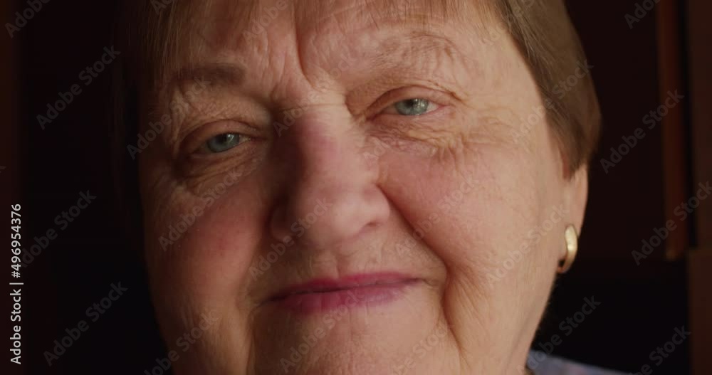Close up of happy senior elderly woman with wrinkles Close up of happy senior elderly woman with wrinkles