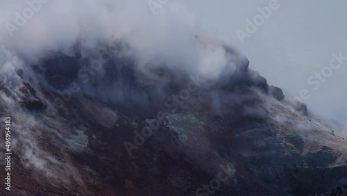 Caldera of Avachinsky stratovolcano, also known as Avacha Volcano. Swinging steam from hot geysers. Kamchatka Peninsula, Russia.