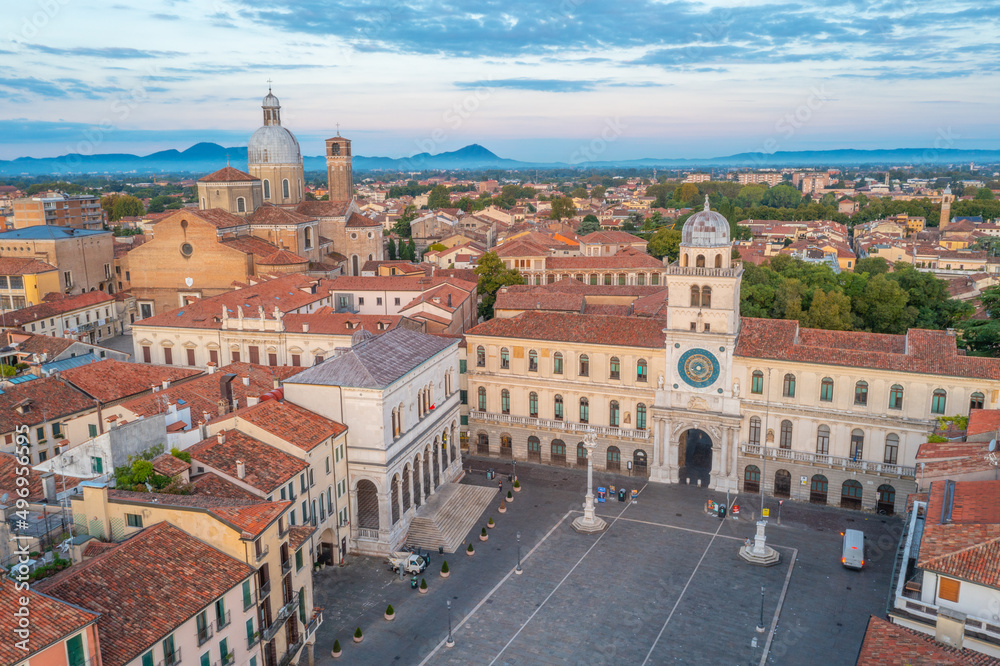 Sunrise view of Torre dell'Orologio and Cathedral of Santa Maria Assunta in Italian town Padua - obrazy, fototapety, plakaty 