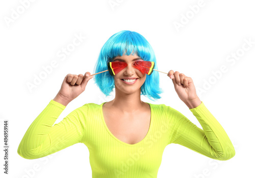 Young woman in blue wig wit...