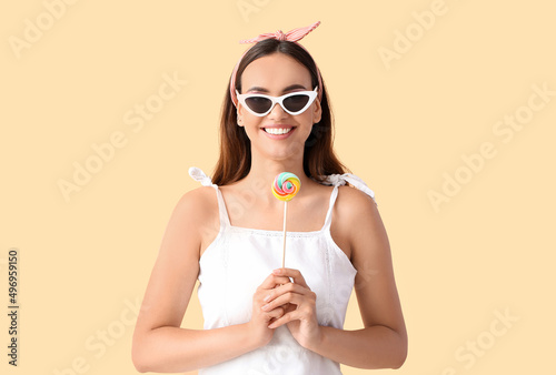 Beautiful young woman in su...
