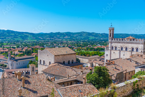 Rooftops in Gubbio with Palazzo dei Consoli, Italy photo