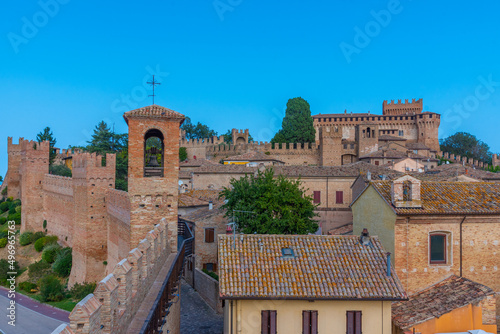 Castello di Gradara overlooking foritified village beneath, Italy photo