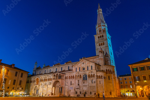 Sunset view of the Cathedral of Modena and Ghirlandina tower in Italy photo