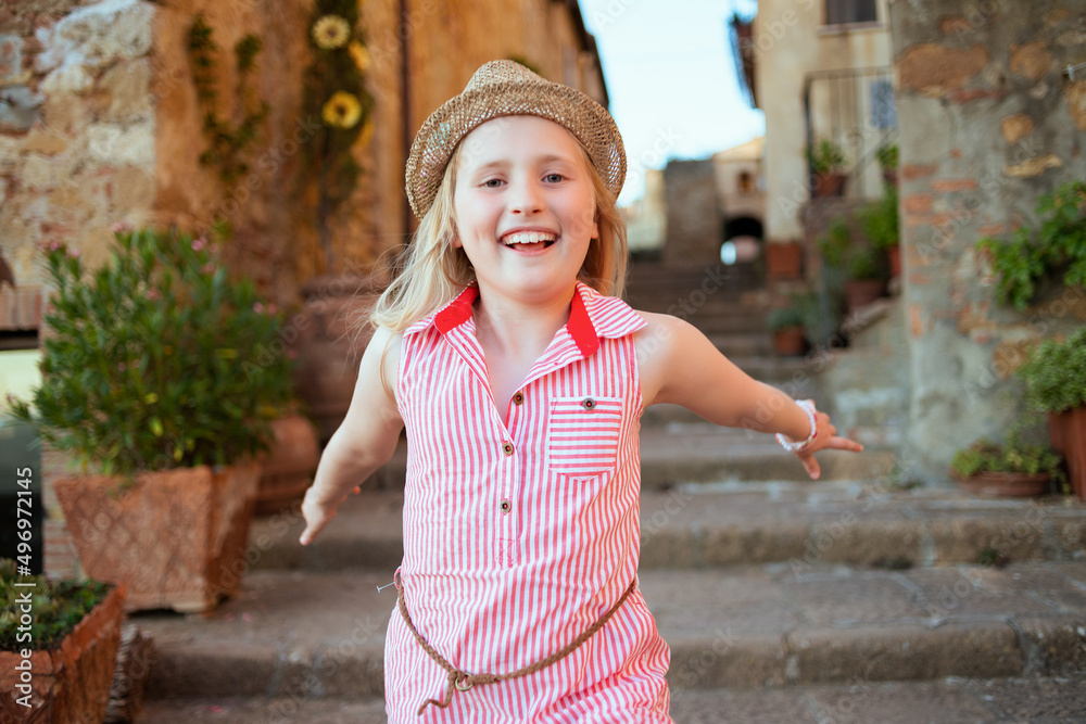happy modern child in Tuscany, Italy exploring attractions happy modern child in Tuscany, Italy exploring attractions
