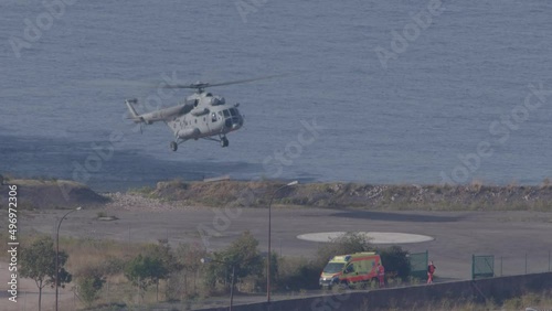 An emergency medical helicopter lands photo