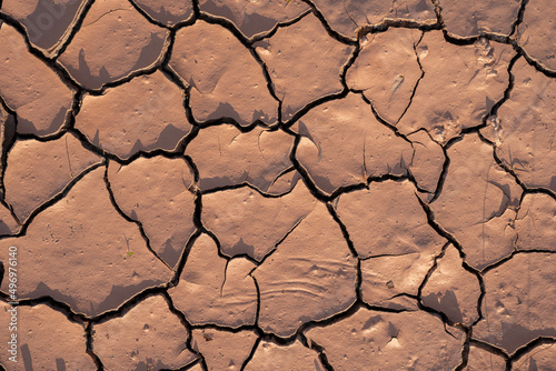 Dry and cracked ground texture.A lifeless land, craquelure