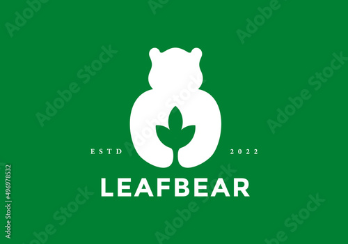 bear logo holding a leaf in negative space style
