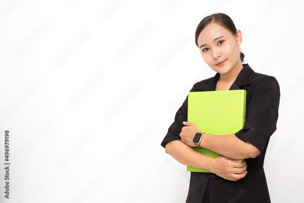 Beautiful Asian business woman wearing black suit holding document folder smiling on white background and copy space. Confident Asian working woman smiling and cheerful Beautiful Asian business woman wearing black suit holding document folder smiling on white background and copy space. Confident Asian working woman smiling and cheerful