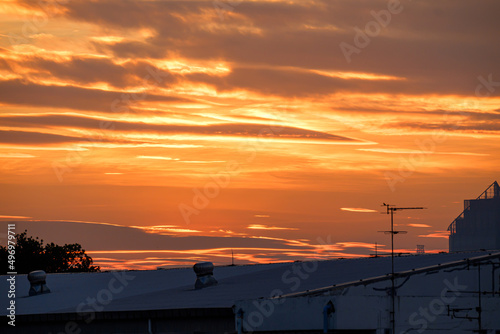 Landscape fantastic Sunset or sunrise with rays of light through the sky. Beautiful white clouds and blue sky high definition skyscraper with grunge texture for background Abstract,nature art style,