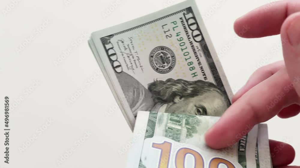 Businessman hands counting dollar banknotes close up Businessman hands counting dollar banknotes close up