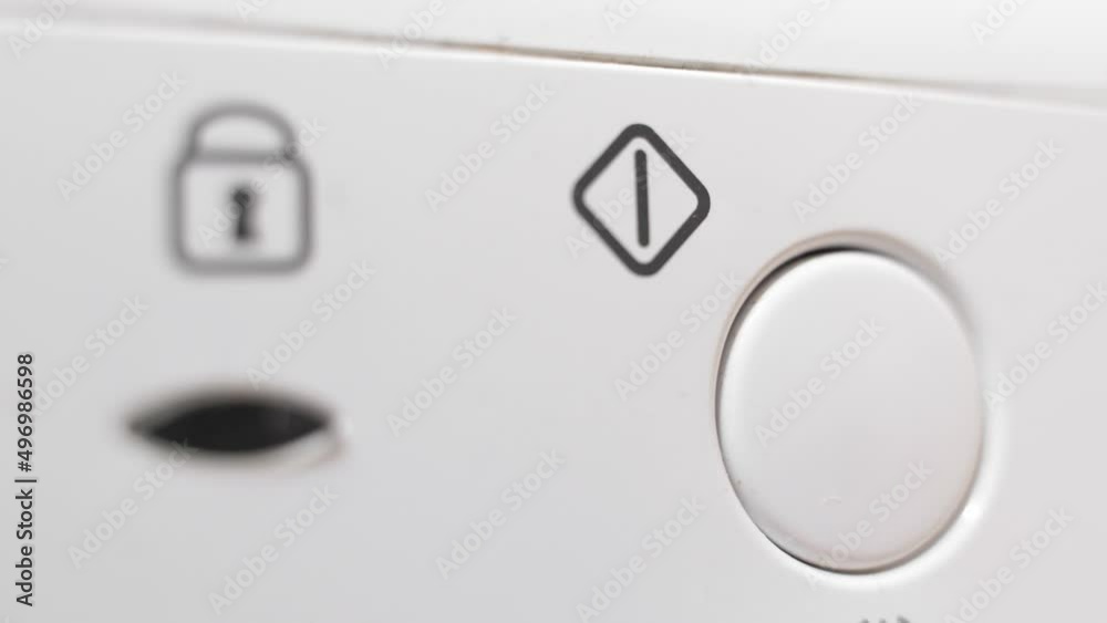 Washing machine door indicator. The finger presses the button to turn on the washing machine. Lock against accidental opening Washing machine door indicator. The finger presses the button to turn on the washing machine. Lock against accidental opening