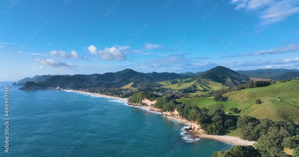 Turning flight high above the coastline at Whiritoa Beach - New Zealand Turning flight high above the coastline at Whiritoa Beach - New Zealand