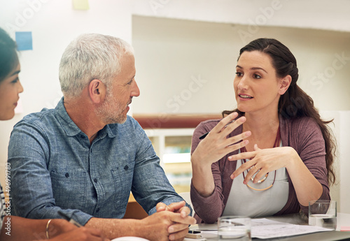 Id like to offer a few suggestions. Shot of a team of colleagues having a meeting in a modern office.