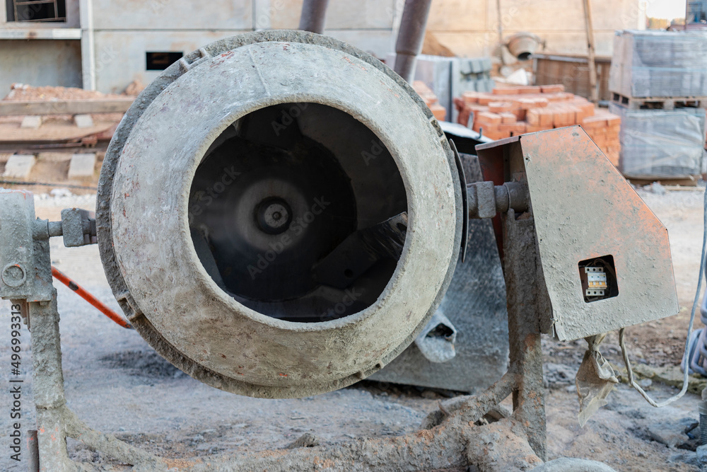 Industrial concrete mixer at a construction site. Preparation of concrete and mortar.