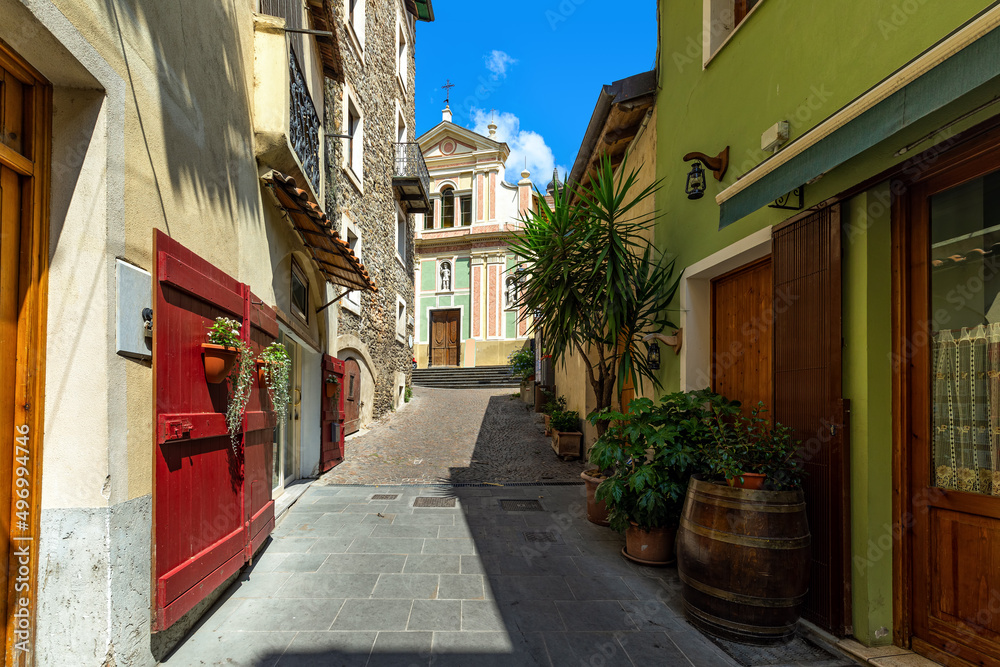 Fototapeta premium Narrow street among small houses in Dolceacqua, Italy.