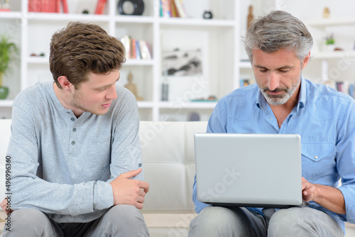 a busy dad with the laptop