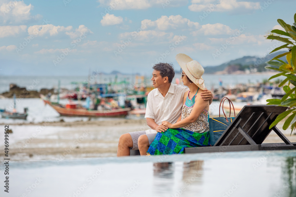 Middle aged couple relaxing at lamai beach in koh samui ,Thailand.