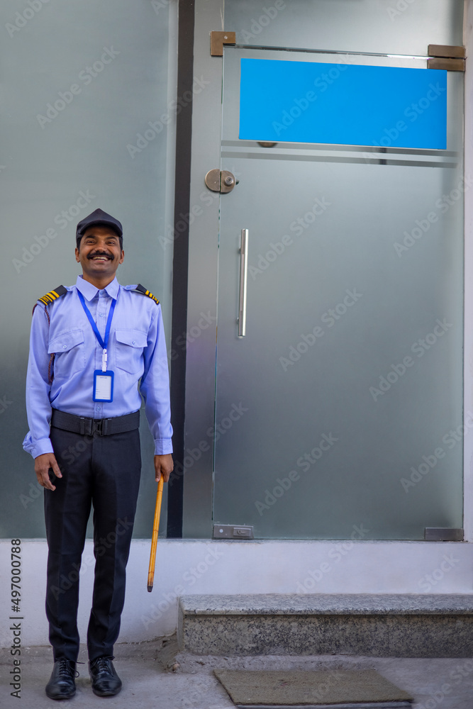 Fototapeta premium Security guard working in front of gate