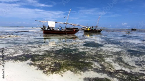 Fishing boats in the Indian Ocean. Tanzaniz. Zanziibar. photo