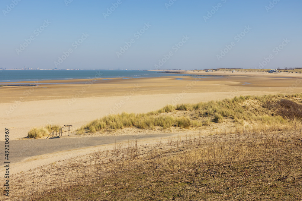 The mouth of the Scheldt with sandy beaches and with the contours of Vlissingen in a far distance The mouth of the Scheldt with sandy beaches and with the contours of Vlissingen in a far distance
