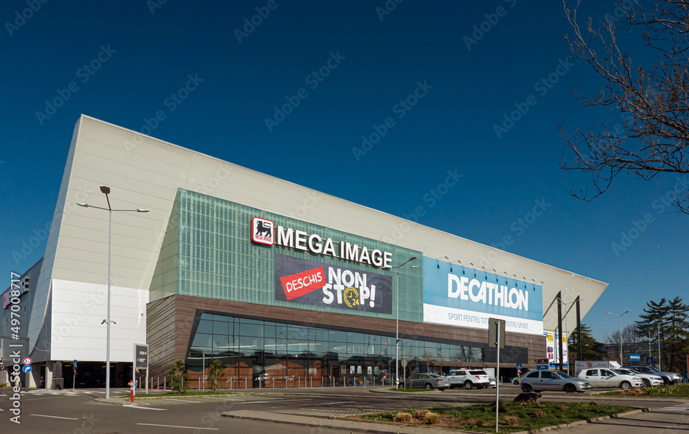 Mega Image grocery store part of Delhaize Group and Decathlon sport related  store building in the north part of Bucharest. Romania, 2022. Stock Photo |  Adobe Stock