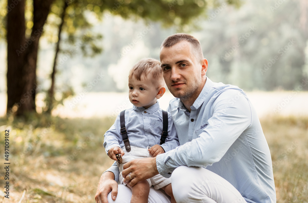 Fototapeta premium Father and son having fun outdoors