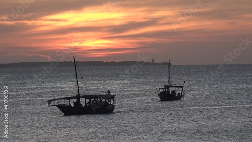 Fishing boats in the Indian Ocean. Tanzaniz. Zanziibar. photo