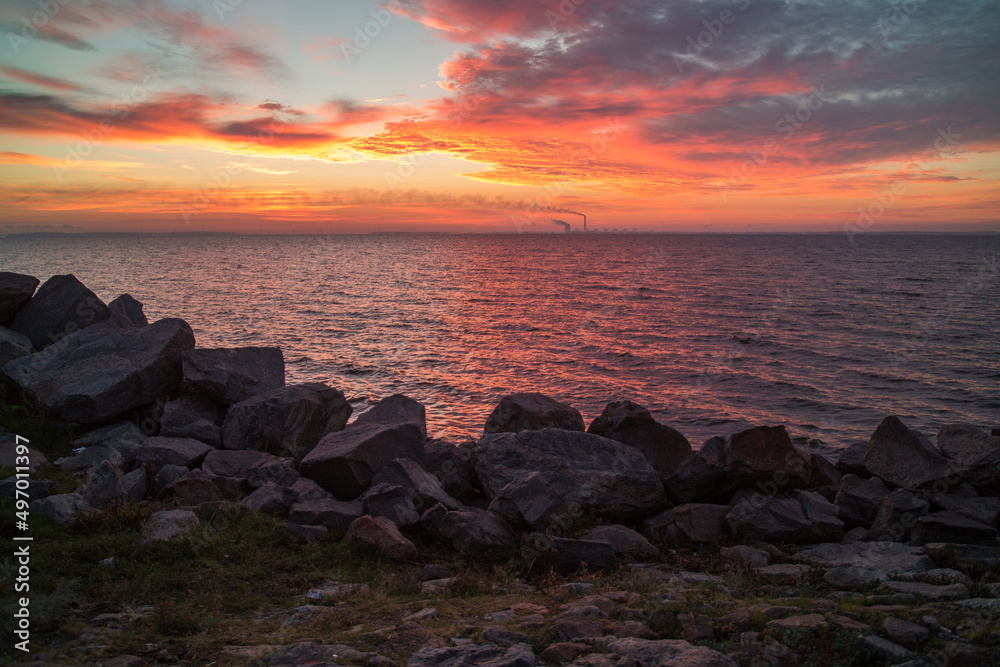 
View from sunrise or sunset
Zaporozhye nuclear power plant in Energodar, Ukraine, close-up from the embankment of Nikopol