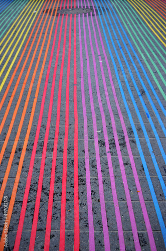 Rainbow, symbol of gay pride, painted as a crosswalk in Castro district, San Francisco, California, USA