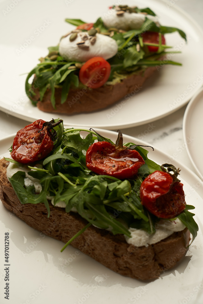 Bruschetta with Tomato, cheese and herbs Bruschetta with Tomato, cheese and herbs