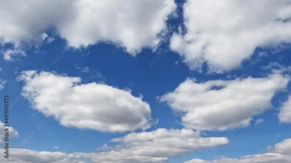 Blue sky, white clouds, background.
