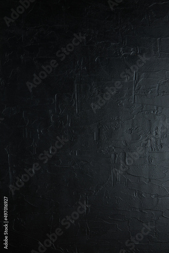 Elegant black background with vintage distressed grunge texture and dark gray charcoal color paint