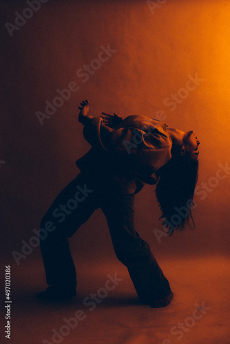 Orange art fashionable portrait of a girl