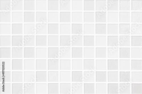 White ceramic wall and floor tile abstract background. Design geometric gray mosaic texture decoration of the bedroom. Simple seamless pattern grid for backdrop hospital wall, canteen and kitchen.