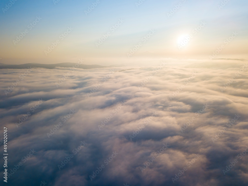 High flight above the clouds. Aerial drone view. High flight above the clouds. Aerial drone view.