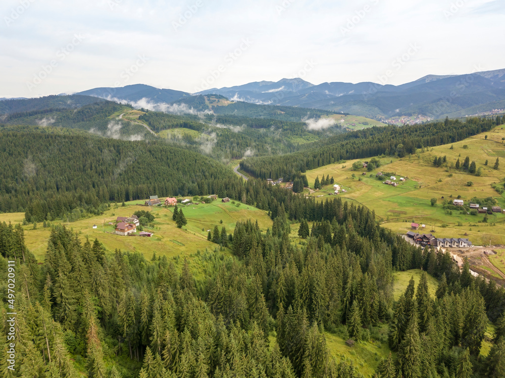 Green mountains of Ukrainian Carpathians in summer. Aerial drone view.