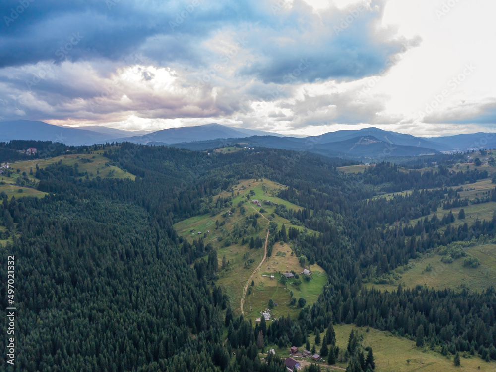 Obraz premium Green Ukrainian Carpathians mountains in summer. Aerial drone view.