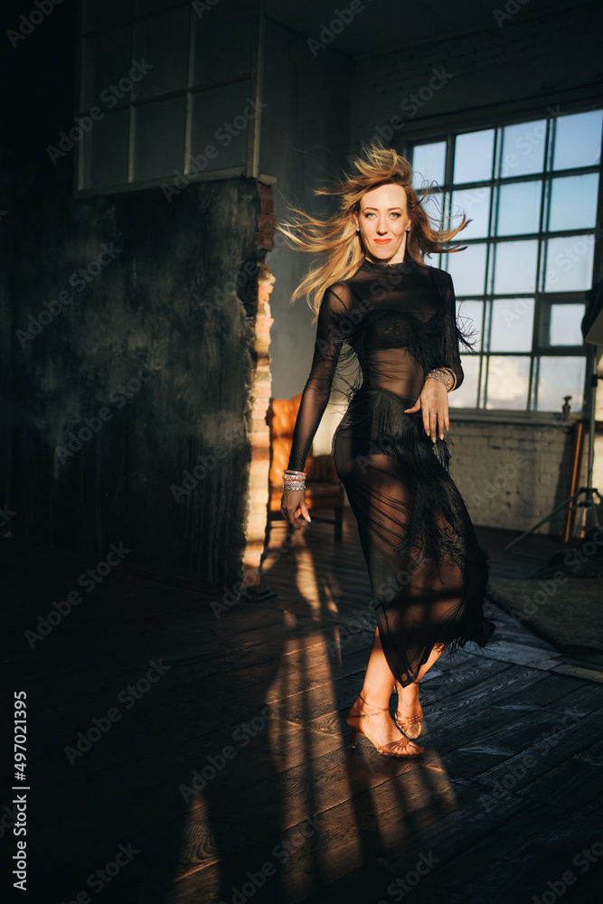 Portrait of beautiful woman professional ballroom dancer in loft studio. Sport life concept. Passion and emotional dance. Portrait of beautiful woman professional ballroom dancer in loft studio. Sport life concept. Passion and emotional dance.