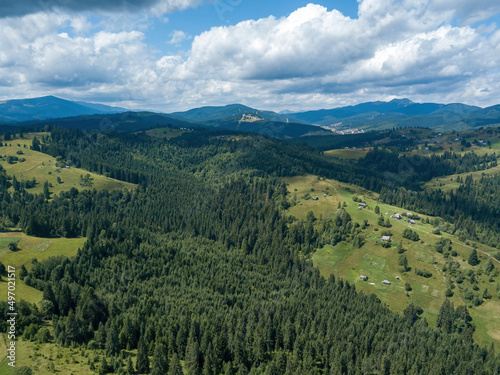 Green Ukrainian Carpathians mountains in summer. Aerial drone view. © Sergey