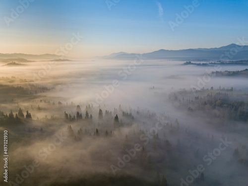 Morning fog in the Ukrainian Carpathians. Aerial drone view.