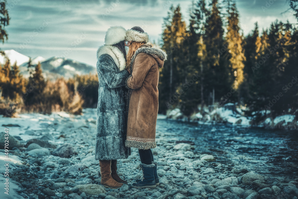 two shaman woman in nature, winter landscape. two shaman woman in nature, winter landscape.