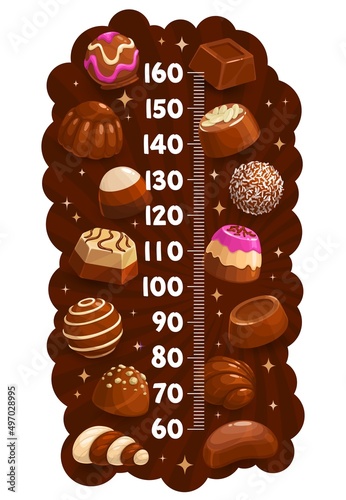 Kids height chart with chocolate marzipan, truffle, praline, nougat, roasted nuts candy sweets. Children growth measure meter ruler scale with chocolate praline candies, coconut flakes and cream