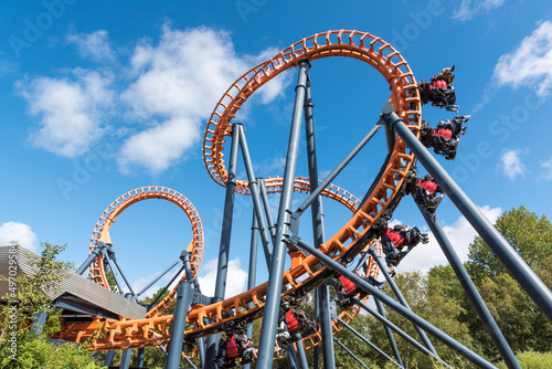 Ferris wheel and roller coaster, France photo