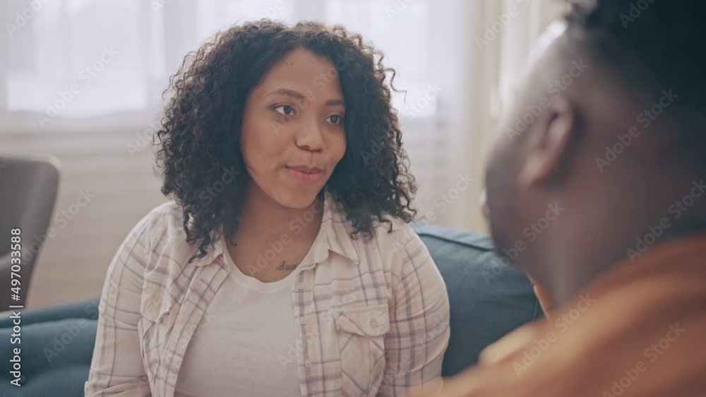 African American husband and wife spending time together, talking and dreaming African American husband and wife spending time together, talking and dreaming
