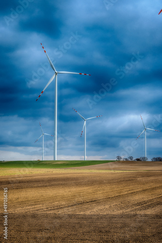 Electric wind turbine generating with blue sky and turbo generator