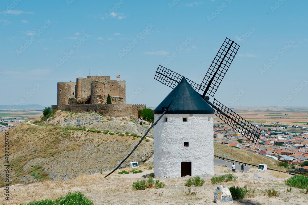 Ancient whitewashed windmill from top of the hill in Consuegra, Toledo, Spain