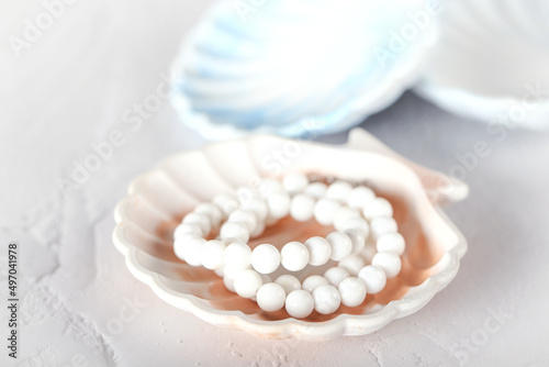 a shell-shaped stand made of gypsum. handmade, seashell. the product is made of gypsum.