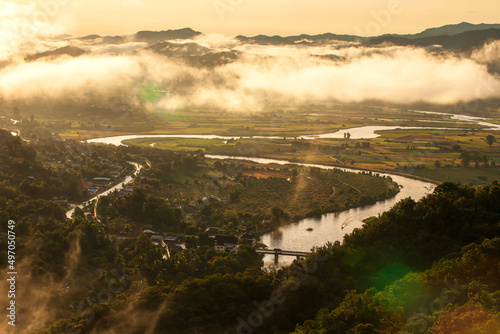 Aerial view of the Kok River during sunrise.