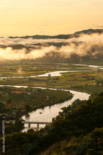 Aerial view of the Kok River during sunrise.